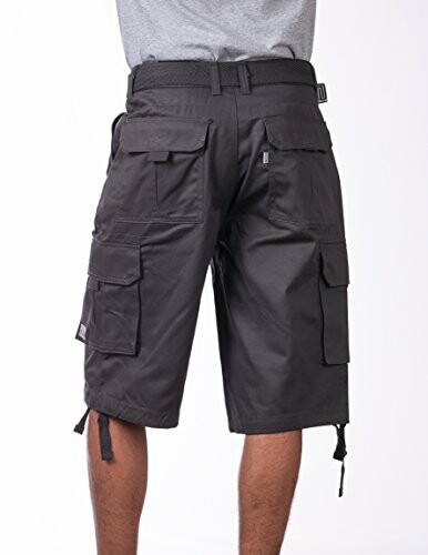 Back view of black cargo shorts worn by a person