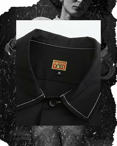 Close-up of a black jacket collar with a label.