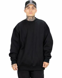 Person wearing a black sweatshirt and cap