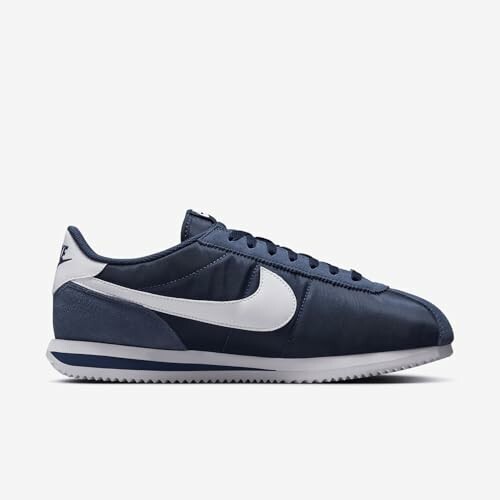 Blue Nike Cortez sneaker with white swoosh