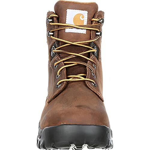 Front view of a brown leather work boot with yellow laces. 