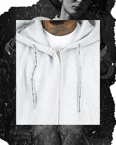 Front view of a grey hoodie on a person with a tattooed neck.