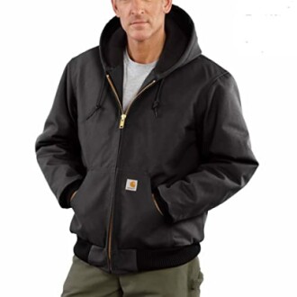 Man wearing a black hooded jacket with zipper.