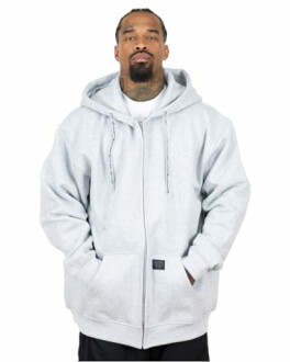 Person wearing a gray hoodie with hands in pockets.
