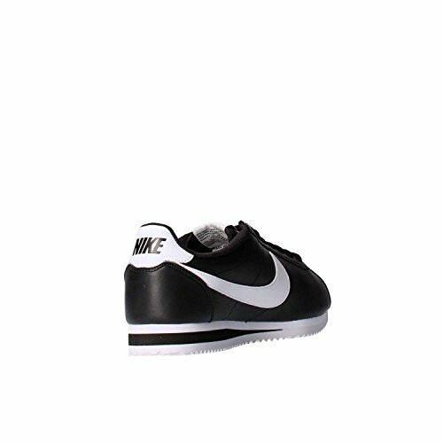 Black Nike Cortez shoe with white swoosh