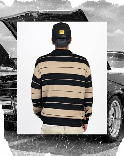 Man wearing a striped sweater facing away with a car in the background.