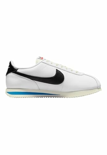 White sneaker with black swoosh and blue detail