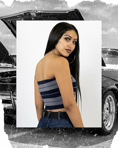 Woman in a striped top with a car background